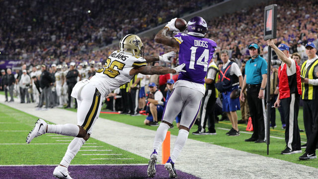 MINNEAPOLIS, MN - OCTOBER 28: Stefon Diggs #14 of the Minnesota Vikings catches the ball for a touchdown in the first quarter of the game against the New Orleans Saints at U.S. Bank Stadium on October 28, 2018 in Minneapolis, Minnesota.