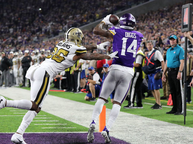 MINNEAPOLIS, MN - OCTOBER 28: Stefon Diggs #14 of the Minnesota Vikings catches the ball for a touchdown in the first quarter of the game against the New Orleans Saints at U.S. Bank Stadium on October 28, 2018 in Minneapolis, Minnesota.