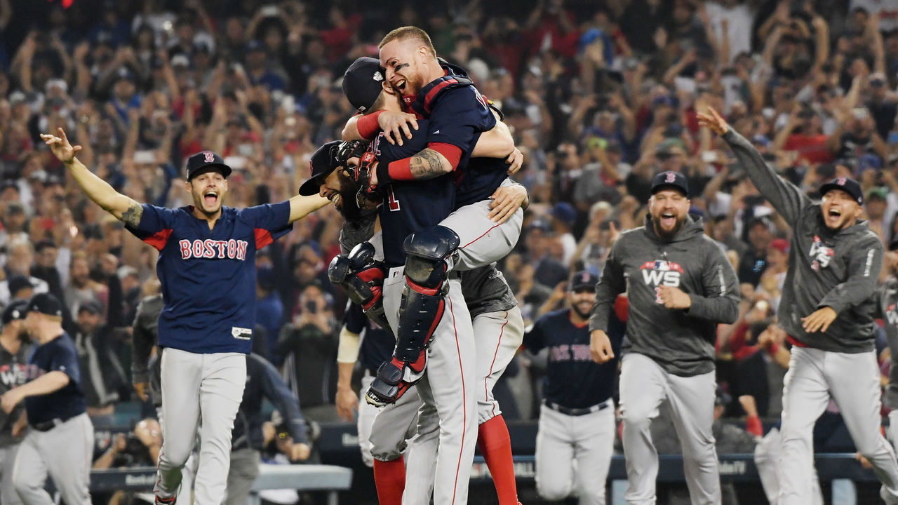 LOS ANGELES, CA - OCTOBER 28: Christian Vazquez #7 jumps into the arms of Chris Sale #41 of the Boston Red Sox to celebrate their 5-1 win over the Los Angeles Dodgers in Game Five to win the 2018 World Series at Dodger Stadium on October 28, 2018 in Los Angeles, California.