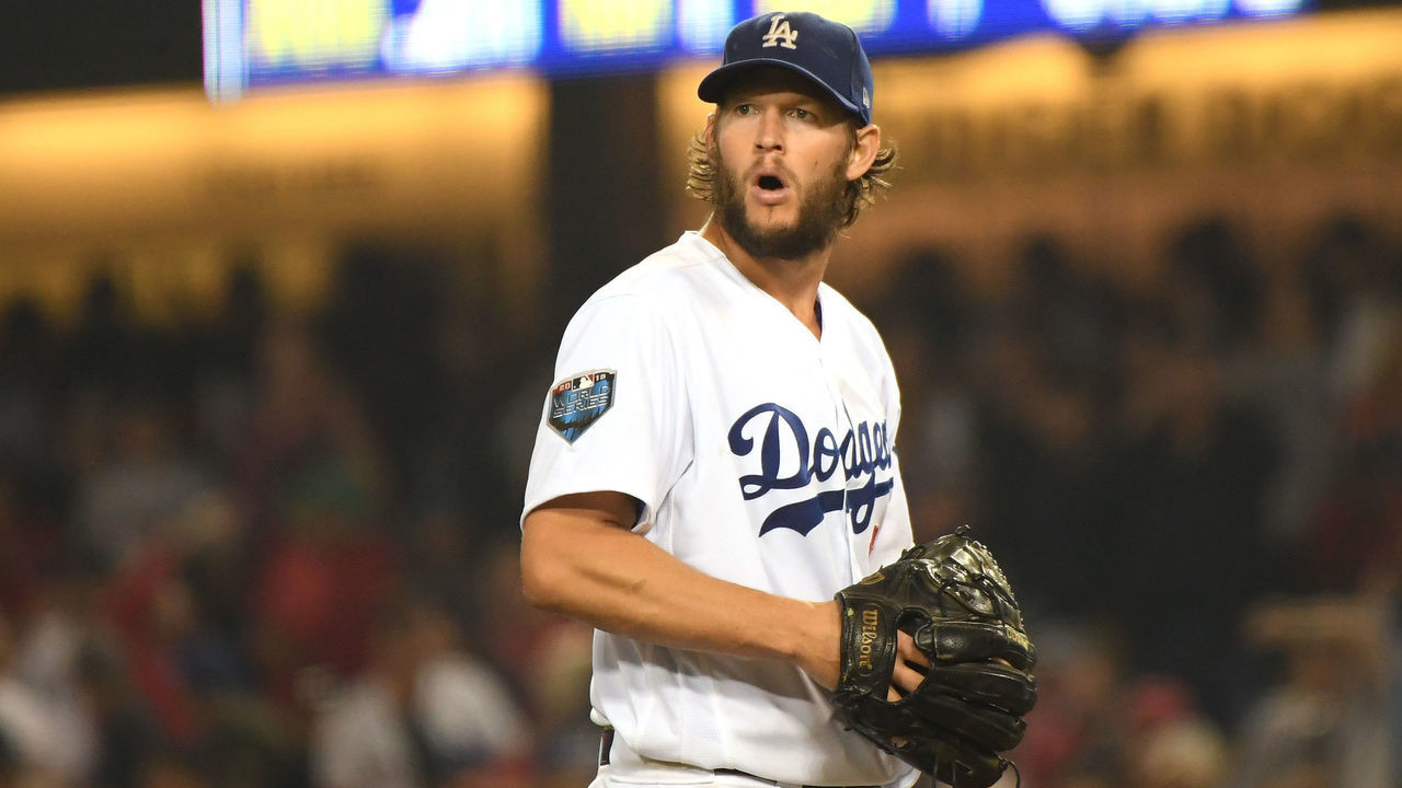 LOS ANGELES, CA - OCTOBER 28: Clayton Kershaw #22 of the Los Angeles Dodgers walks off the field after pitching during the seventh inning against the Boston Red Sox in Game Five of the 2018 World Series at Dodger Stadium on October 28, 2018 in Los Angeles, California.