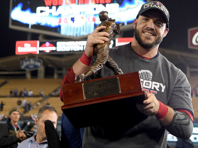 LOS ANGELES, CA - OCTOBER 28: Steve Pearce #25 of the Boston Red Sox is awarded the MVP after defeating the Los Angeles Dodgers 5-1 in Game Five of the 2018 World Series at Dodger Stadium on October 28, 2018 in Los Angeles, California.