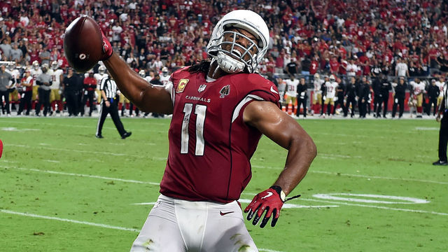 GLENDALE, AZ - OCTOBER 28: Wide receiver Larry Fitzgerald #11 of the Arizona Cardinals reacts after scoring a two point conversion during the fourth quarter against the San Francisco 49ers at State Farm Stadium on October 28, 2018 in Glendale, Arizona.