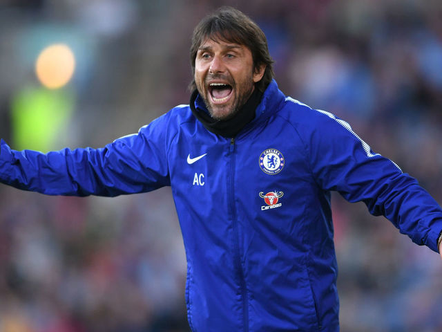 BURNLEY, ENGLAND - APRIL 19: Antonio Conte, Manager of Chelsea gives his team instructions during the Premier League match between Burnley and Chelsea at Turf Moor on April 19, 2018 in Burnley, England.