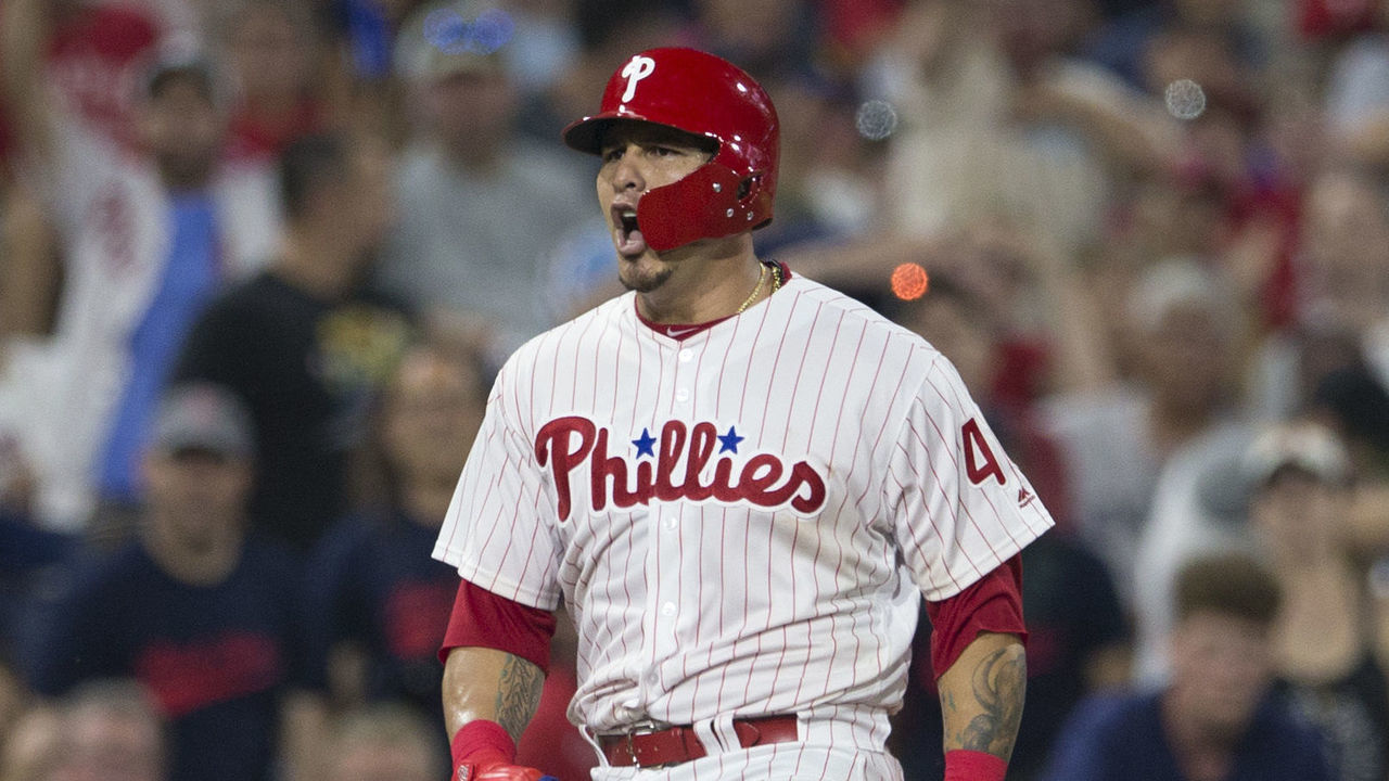 PHILADELPHIA, PA - AUGUST 15: Wilson Ramos #40 of the Philadelphia Phillies reacts in front of Rafael Devers #11 of the Boston Red Sox after hitting a triple in the bottom of the sixth inning at Citizens Bank Park on August 15, 2018 in Philadelphia, Pennsylvania. The Phillies defeated the Red Sox 7-4.