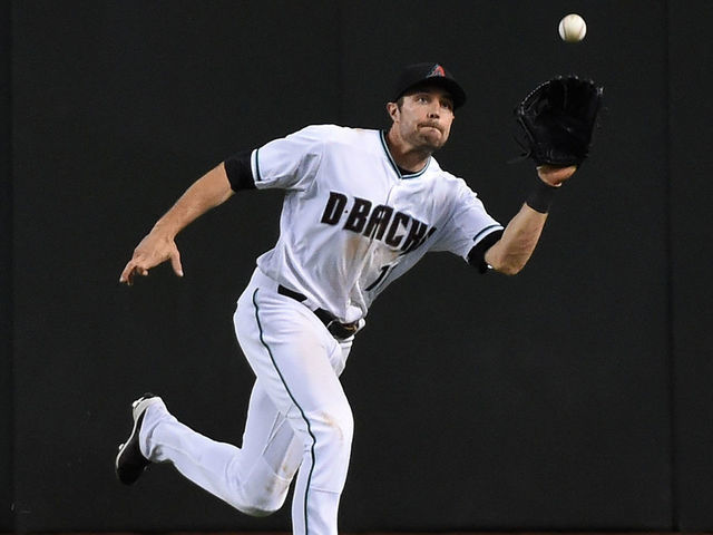 PHOENIX, AZ - APRIL 28: AJ Pollock #11 of the Arizona Diamondbacks makes a running catch on a fly ball to center field during the fifth inning against the Colorado Rockies at Chase Field on April 28, 2017 in Phoenix, Arizona. Rockies won 3-1.