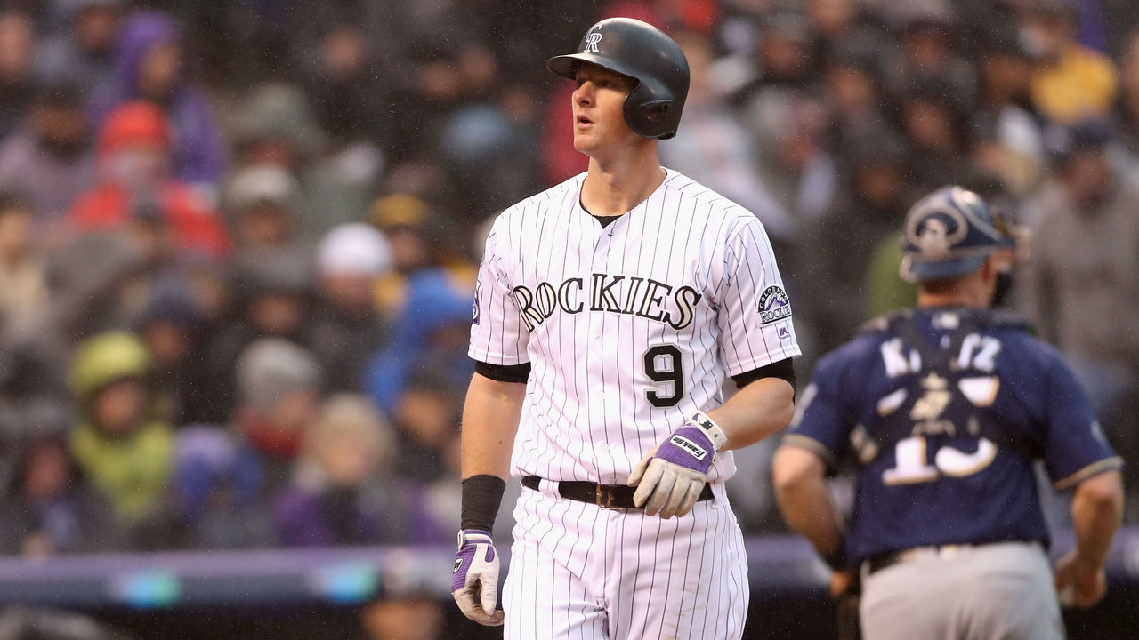 DENVER, CO - OCTOBER 07: DJ LeMahieu #9 of the Colorado Rockies reacts after striking out in the eighth inning of Game Three of the National League Division Series against the Milwaukee Brewers at Coors Field on October 7, 2018 in Denver, Colorado.