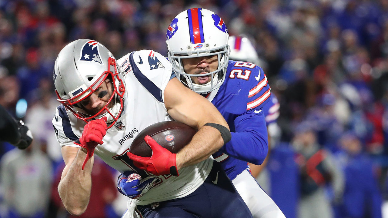 BUFFALO, NY - OCTOBER 29: Julian Edelman #11 of the New England Patriots is tackled by Phillip Gaines #28 of the Buffalo Bills during NFL game action at New Era Field on October 29, 2018 in Buffalo, New York.