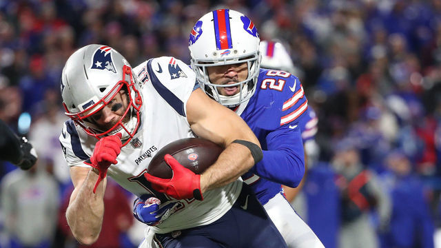 BUFFALO, NY - OCTOBER 29: Julian Edelman #11 of the New England Patriots is tackled by Phillip Gaines #28 of the Buffalo Bills during NFL game action at New Era Field on October 29, 2018 in Buffalo, New York.
