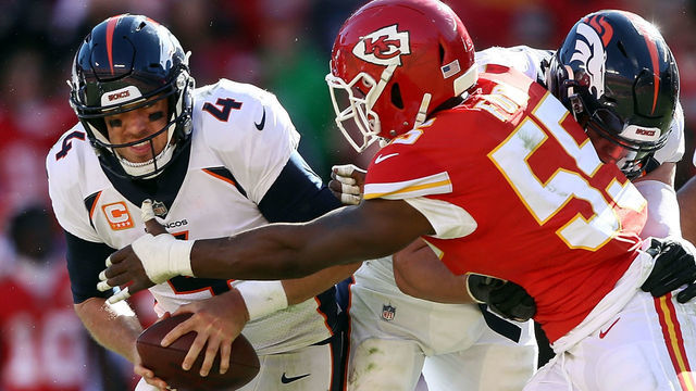 KANSAS CITY, MO - OCTOBER 28: Quarterback Case Keenum #4 of the Denver Broncos is hit by linebacker Dee Ford #55 of the Kansas City Chiefs during the game at Arrowhead Stadium on October 28, 2018 in Kansas City, Missouri.