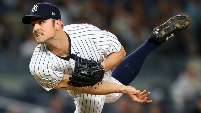 NEW YORK, NY - MAY 11: David Robertson #30 of the New York Yankees pitches against the Oakland Athletics in the ninth inning at Yankee Stadium on May 11, 2018 in the Bronx borough of New York City.