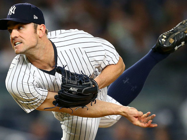 NEW YORK, NY - MAY 11: David Robertson #30 of the New York Yankees pitches against the Oakland Athletics in the ninth inning at Yankee Stadium on May 11, 2018 in the Bronx borough of New York City.