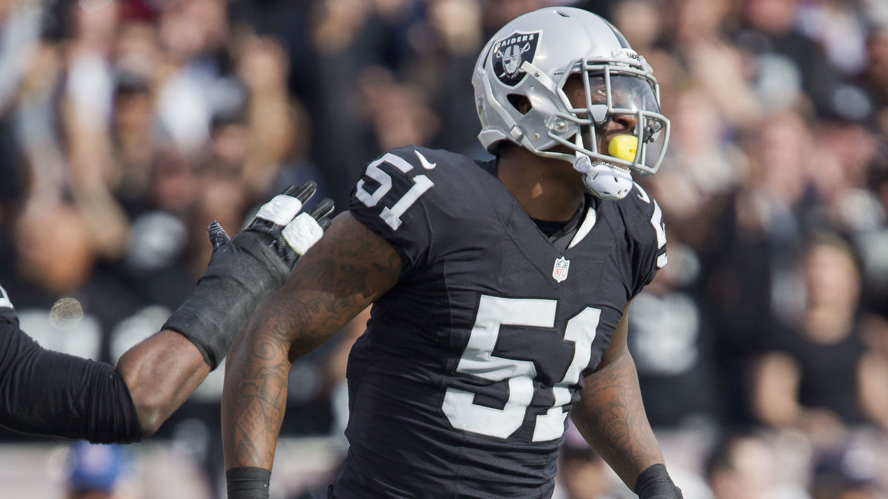 OAKLAND, CA - DECEMBER 4: Outside linebacker Bruce Irvin #51 of the Oakland Raiders celebrates after sacking quarterback Tyrod Taylor #5 of the Buffalo Bills in the first quarter on December 4, 2016 at Oakland-Alameda County Coliseum in Oakland, California. The Raiders won 38-24.