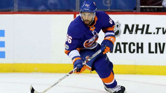 NEW YORK, NY - OCTOBER 07: Joshua Ho-Sang #66 of the New York Islanders passes the puck against the Buffalo Sabres in the first period at Barclays Center on October 7, 2017 in the Brooklyn Borough of New York City.