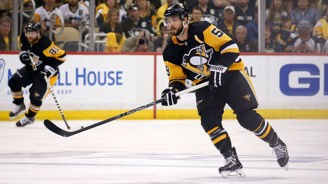 PITTSBURGH, PA - MAY 03: Kris Letang #58 of the Pittsburgh Penguins controls the puck in Game Four of the Eastern Conference Second Round during the 2018 NHL Stanley Cup Playoffs against the Washington Capitals at PPG PAINTS Arena on May 3, 2018 in Pittsburgh, Pennsylvania. *** Local Caption *** Kris Letang