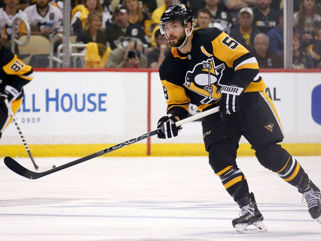PITTSBURGH, PA - MAY 03: Kris Letang #58 of the Pittsburgh Penguins controls the puck in Game Four of the Eastern Conference Second Round during the 2018 NHL Stanley Cup Playoffs against the Washington Capitals at PPG PAINTS Arena on May 3, 2018 in Pittsburgh, Pennsylvania. *** Local Caption *** Kris Letang