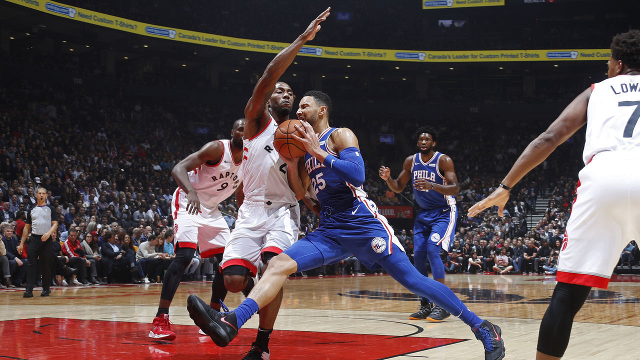 TORONTO, CANADA - OCTOBER 30: Ben Simmons #25 of the Philadelphia 76ers drives to the basket while guarded by Kawhi Leonard #2 of the Toronto Raptors on October 30, 2018 at Soctiabank Arena in Toronto, Ontario, Canada. Mandatory Copyright Notice: Copyright 2018 NBAE