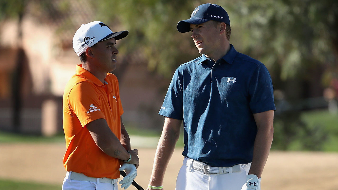 SCOTTSDALE, AZ - FEBRUARY 05: (L-R) Rickie Fowler and Jordan Spieth talk on the first hole during the final round of the Waste Management Phoenix Open at TPC Scottsdale on February 5, 2017 in Scottsdale, Arizona.