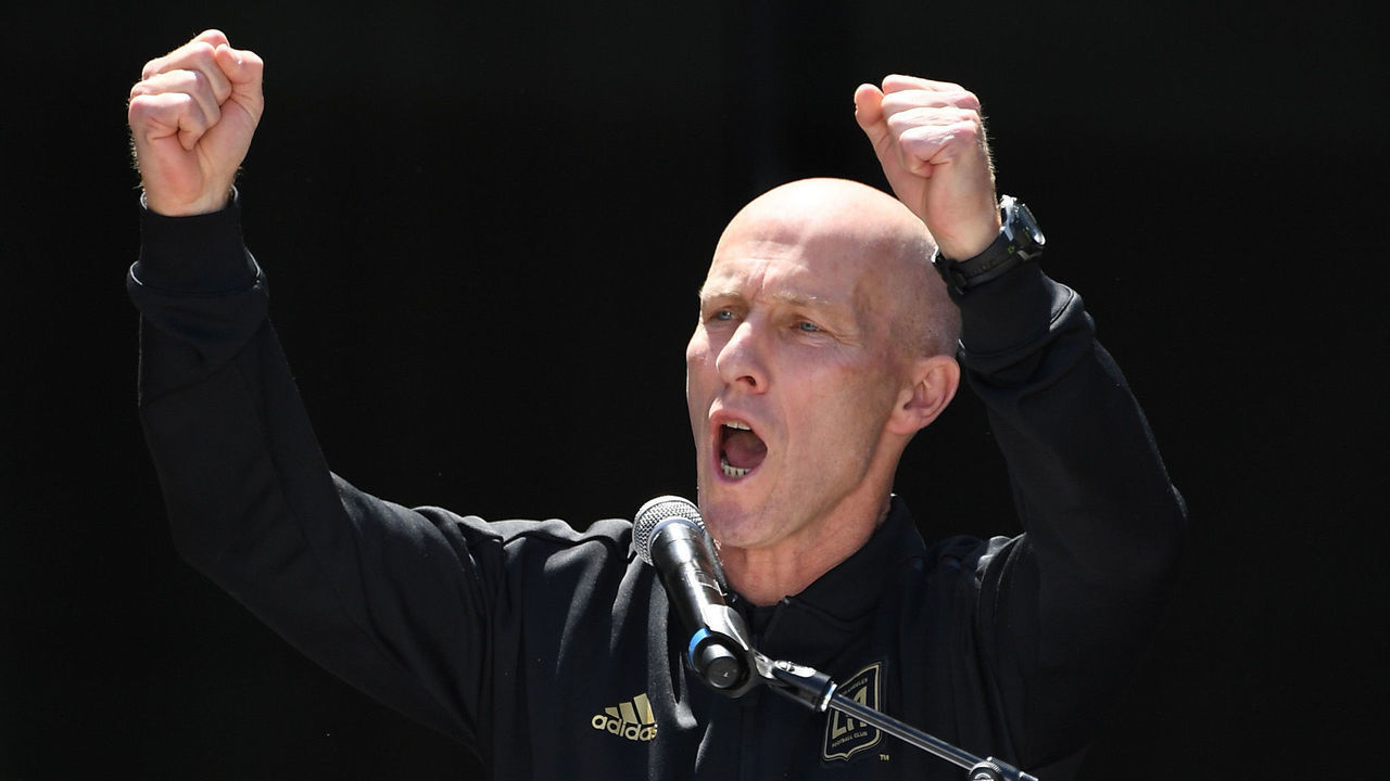 LOS ANGELES, CA - APRIL 18: Head coach Bob Bradly of the Los Angeles FC cheers with fans during the ribbon cutting ceremony for the new Banc of California Stadium on April 18, 2018 in Los Angeles, California.