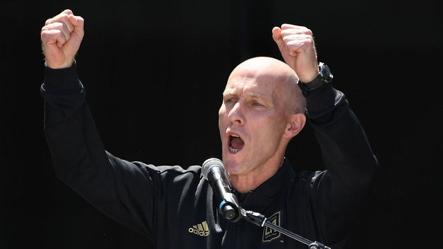 LOS ANGELES, CA - APRIL 18: Head coach Bob Bradly of the Los Angeles FC cheers with fans during the ribbon cutting ceremony for the new Banc of California Stadium on April 18, 2018 in Los Angeles, California.