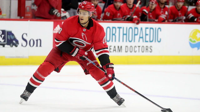 RALEIGH, NC - OCTOBER 20: Sebastian Aho #20 of the Carolina Hurricanes controls the puck on the ice during an NHL game against the Colorado Avalanche on October 20, 2018 at PNC Arena in Raleigh, North Carolina.