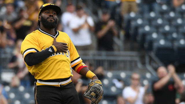PITTSBURGH, PA - SEPTEMBER 23: Josh Harrison #5 of the Pittsburgh Pirates acknowledges the crowd as he is removed from the game against the Milwaukee Brewers in the eighth inning at PNC Park on September 23, 2018 in Pittsburgh, Pennsylvania.