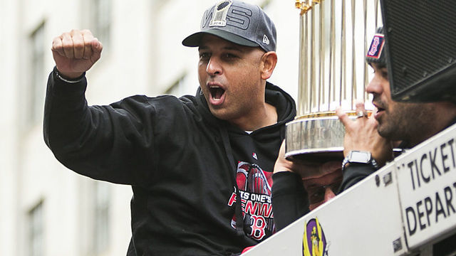 BOSTON, MA - OCTOBER 31: Manager Alex Cora of the Boston Red Sox acknowledges fans during the 2018 World Series victory parade on October 31, 2018 in Boston, Massachusetts.