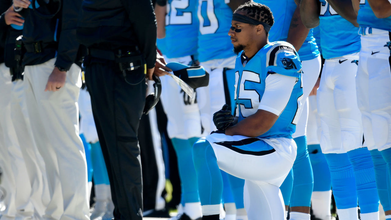 CHARLOTTE, NC - OCTOBER 28: Eric Reid #25 of the Carolina Panthers kneels during the anthem against the Baltimore Ravens at Bank of America Stadium on October 28, 2018 in Charlotte, North Carolina.