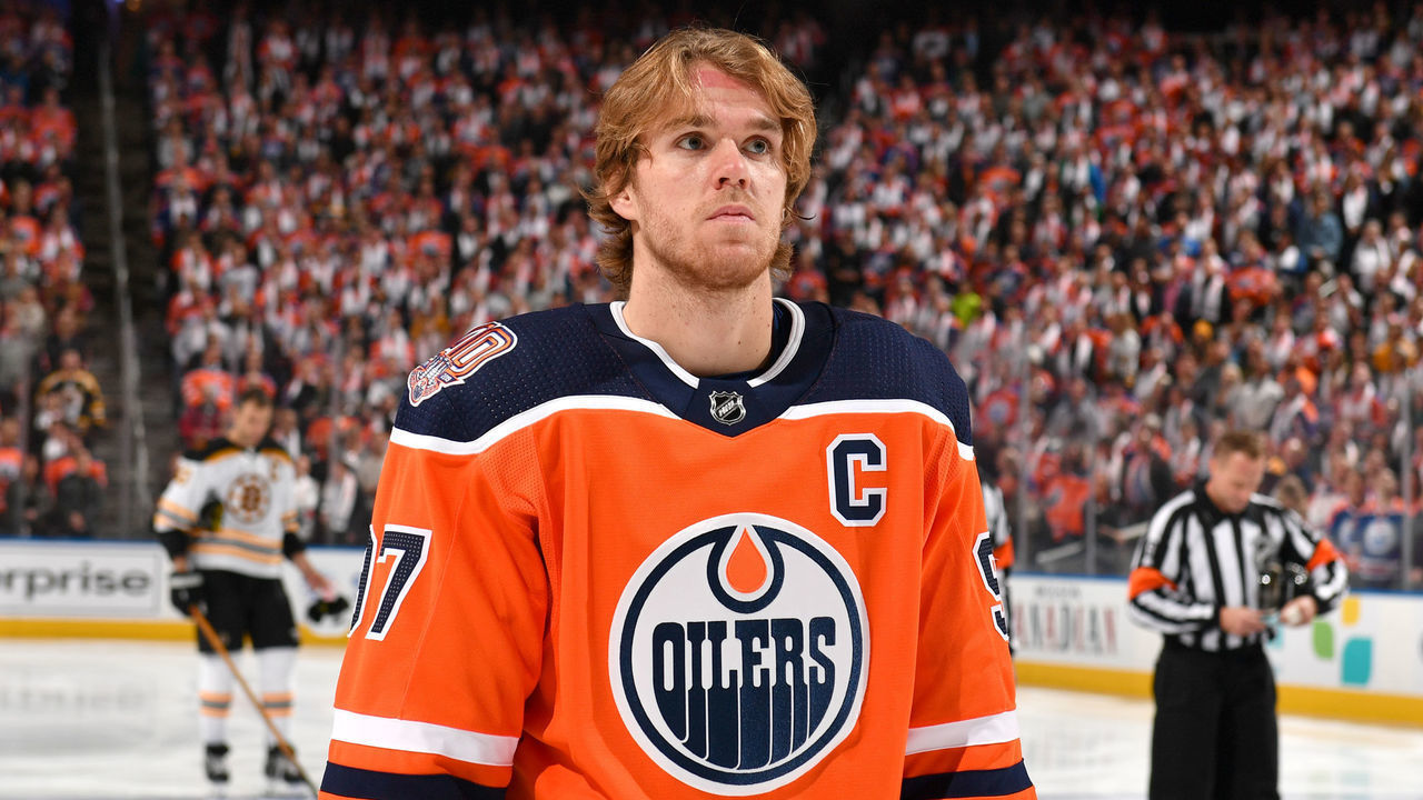 EDMONTON, AB - OCTOBER 18: Connor McDavid #97 of the Edmonton Oilers stands for the singing of the national anthem prior to the game against the Boston Bruins on October 18, 2018 at Rogers Place in Edmonton, Alberta, Canada.