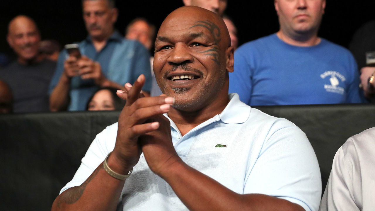 VERONA, NY - JUNE 08: Former World Champion boxer Mike Tyson claps as the 2018 Hall of Fame class is introduced during the Golden Boy on ESPN fight night at Turning Stone Resort Casino on June 8, 2018 in Verona, New York.