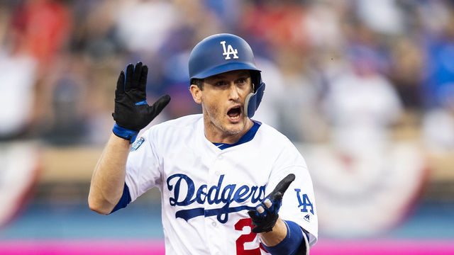 LOS ANGELES, CA - OCTOBER 28: David Freese #25 of the Los Angeles Dodgers reacts after hitting a solo home run during the first inning of game five of the 2018 World Series against the Boston Red Sox on October 28, 2018 at Dodger Stadium in Los Angeles, California.