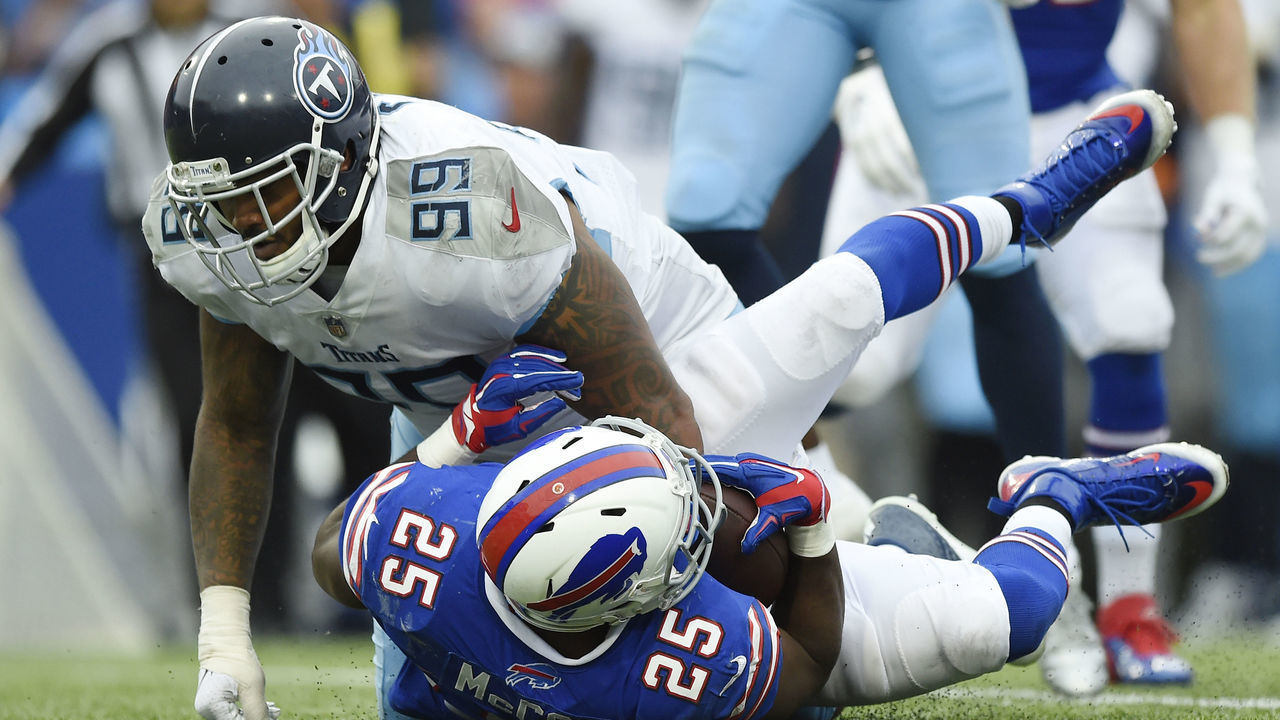 BUFFALO, NY - OCTOBER 07: Running back LeSean McCoy #25 of the Buffalo Bills is tackled by defensive tackle Jurrell Casey #99 of the Tennessee Titans in the fourth quarter at New Era Field on October 7, 2018 in Buffalo, New York.