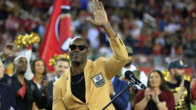 SANTA CLARA, CA - NOVEMBER 01: 2018 Hall of Fame inductee Terrell Owens waves during a ceremony at halftime of the game between the San Francisco 49ers and the Oakland Raiders at Levi's Stadium on November 1, 2018 in Santa Clara, California.