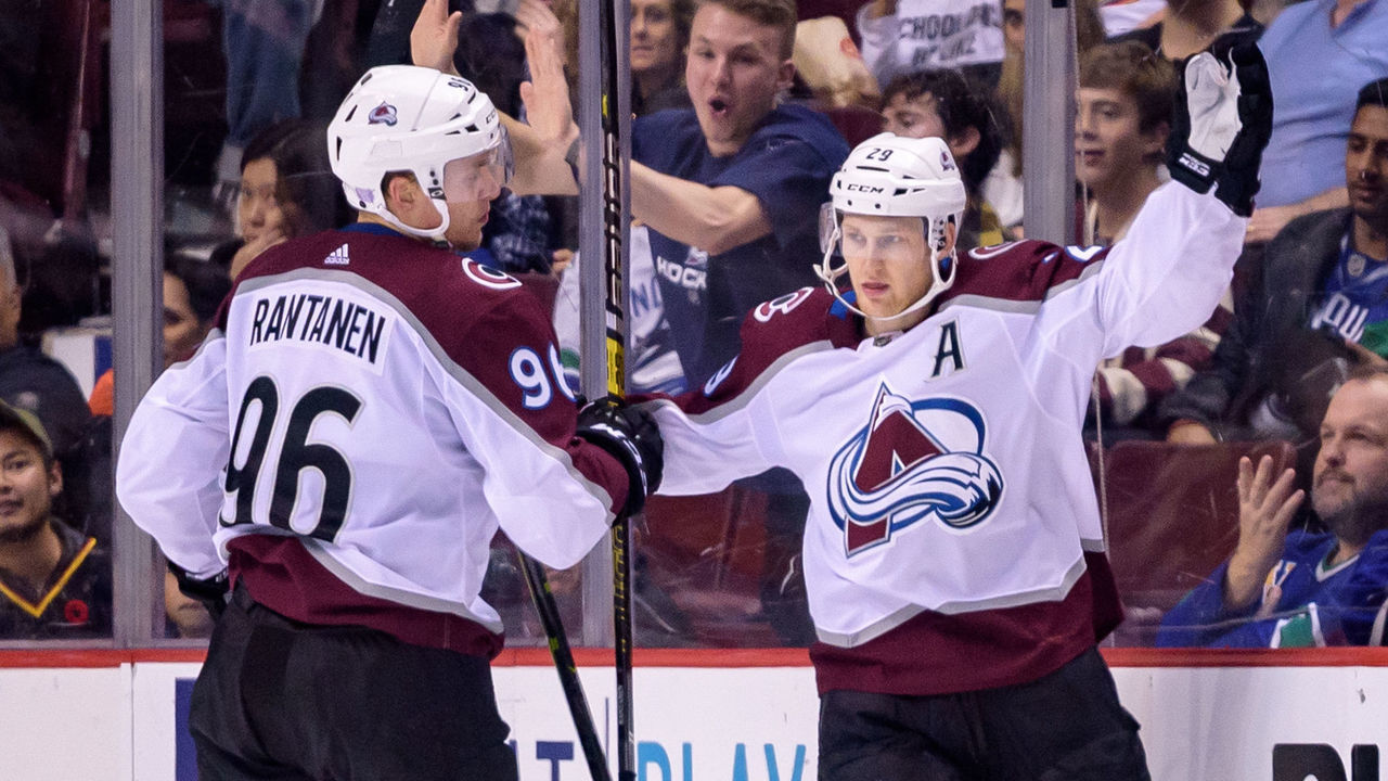 VANCOUVER, BC - NOVEMBER 02: Colorado Avalanche Center Nathan MacKinnon (29) celebrates a goal with Right Wing Mikko Rantanen (96) during their NHL game against the Vancouver Canucks at Rogers Arena on November 2, 2018 in Vancouver, British Columbia, Canada.