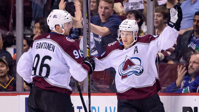 VANCOUVER, BC - NOVEMBER 02: Colorado Avalanche Center Nathan MacKinnon (29) celebrates a goal with Right Wing Mikko Rantanen (96) during their NHL game against the Vancouver Canucks at Rogers Arena on November 2, 2018 in Vancouver, British Columbia, Canada.