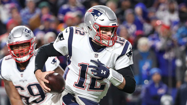 BUFFALO, NY - OCTOBER 29: Tom Brady #12 of the New England Patriots scrambles and rushes with the football as he is flushed out of the pocket during NFL game action against the Buffalo Bills at New Era Field on October 29, 2018 in Buffalo, New York.
