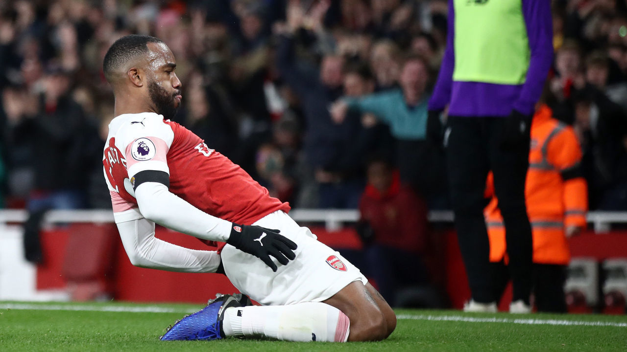 LONDON, ENGLAND - NOVEMBER 03: Alexandre Lacazette of Arsenal celebrates after he scores his sides first goal during the Premier League match between Arsenal FC and Liverpool FC at Emirates Stadium on November 3, 2018 in London, United Kingdom.