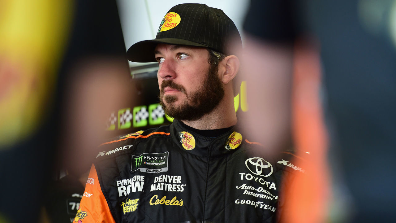 FORT WORTH, TX - NOVEMBER 03: Martin Truex Jr., driver of the #78 Bass Pro Shops/5-hour ENERGY Toyota, stands in the garage area during practice for the Monster Energy NASCAR Cup Series AAA Texas 500 at Texas Motor Speedway on November 3, 2018 in Fort Worth, Texas.