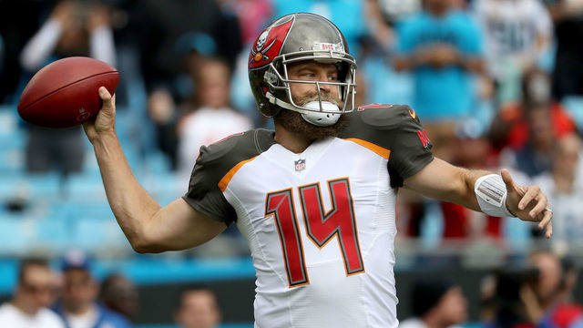 CHARLOTTE, NC - NOVEMBER 04: Ryan Fitzpatrick #14 of the Tampa Bay Buccaneers drops back to pass against the Carolina Panthers during their game at Bank of America Stadium on November 4, 2018 in Charlotte, North Carolina.