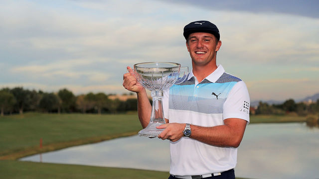 LAS VEGAS, NV - NOVEMBER 04: Bryson DeChambeau poses with the champion's trophy after winning the Shriners Hospitals for Children Open at TPC Summerlin on November 4, 2018 in Las Vegas, Nevada.