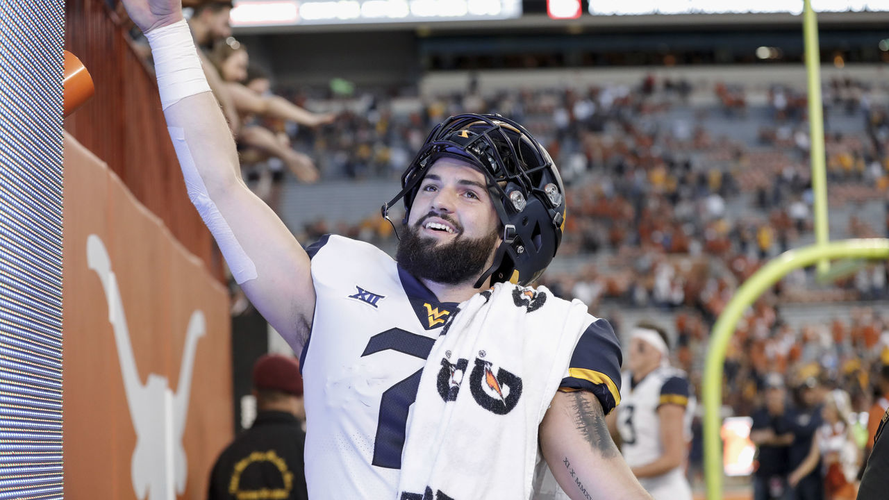 AUSTIN, TX - NOVEMBER 03: Will Grier #7 of the West Virginia Mountaineers celebrates after the game against the Texas Longhorns at Darrell K Royal-Texas Memorial Stadium on November 3, 2018 in Austin, Texas.