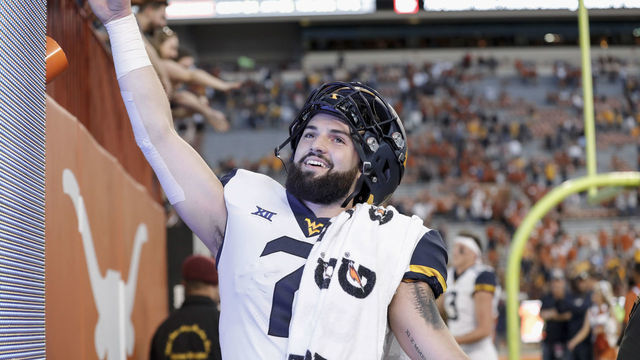 AUSTIN, TX - NOVEMBER 03: Will Grier #7 of the West Virginia Mountaineers celebrates after the game against the Texas Longhorns at Darrell K Royal-Texas Memorial Stadium on November 3, 2018 in Austin, Texas.