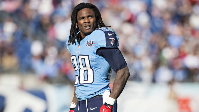 NASHVILLE, TN - DECEMBER 29: Chris Johnson #28 of the Tennessee Titans watches a replay during a game against the Houston Texans at LP Field on December 29, 2013 in Nashville, Tennessee. The Titans defeated the Texans 16-10.