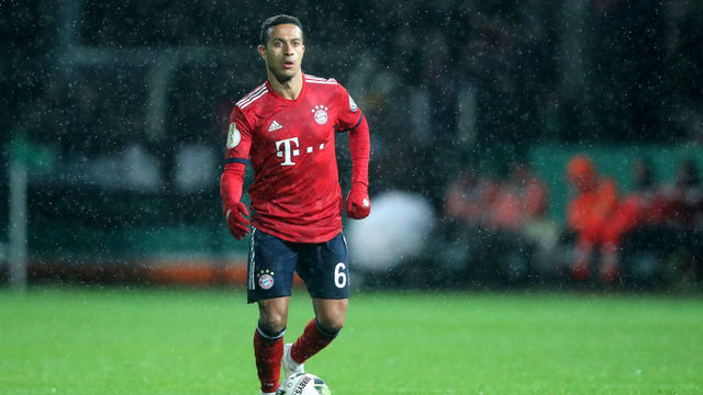 ROEDINGHAUSEN, GERMANY - OCTOBER 30: Thiago of Bayern runs with the ball during the DFB Cup match between SV Rodinghausen and FC Bayern Munich at Hacker-Wiehenstadion on October 30, 2018 in Roedinghausen, Germany.