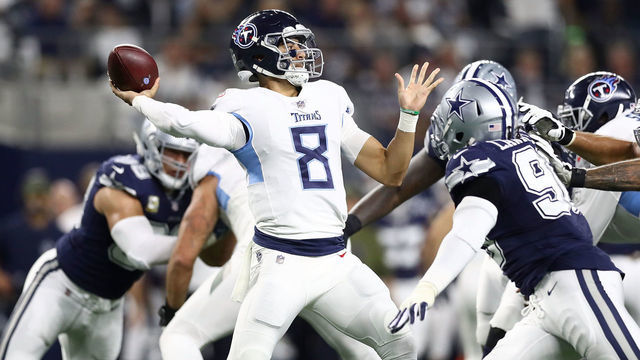 ARLINGTON, TX - NOVEMBER 05: Marcus Mariota #8 of the Tennessee Titans looks to pass agaisnt the Dallas Cowboys in the first quarter of a football game at AT&T Stadium on November 5, 2018 in Arlington, Texas.