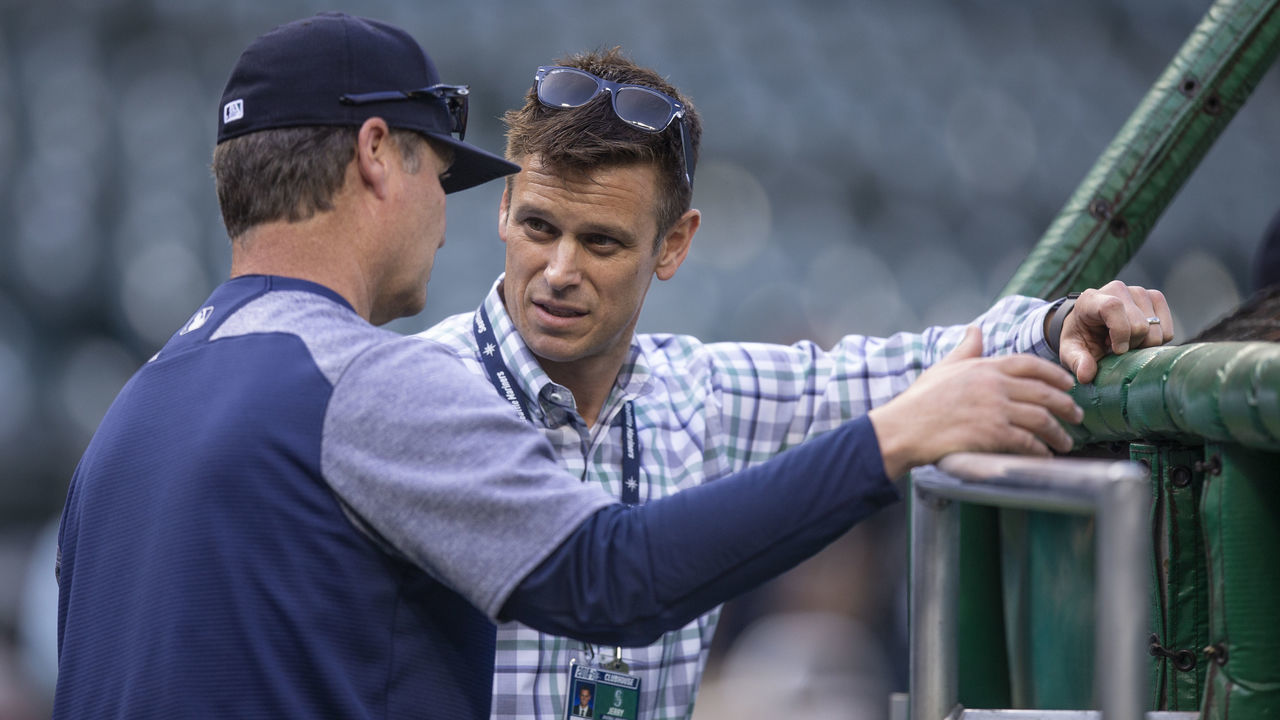 SEATTLE, WA - MAY 3: Seattle Mariners general manager Jerry Dipoto (R) talks with manager Scott Servais before a game between the Oakland Athletics and the Seattle Mariners at Safeco Field on May 3, 2018 in Seattle, Washington. The Mariners won the game 4-1.