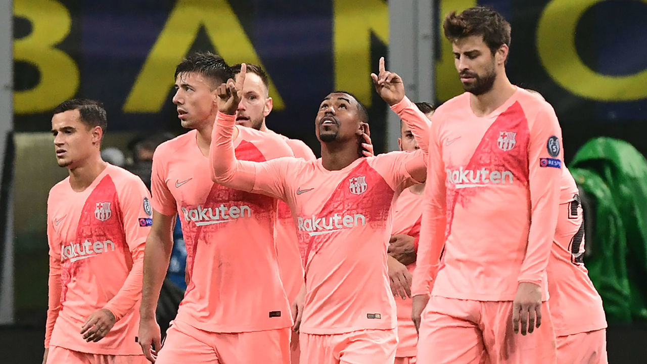 Barcelona's Brazilian midfielder Malcom (c) celebrates after opening the scoring during the UEFA Champions League group B football match Inter Milan vs Barcelona on November 6, 2018 at San Siro stadium in Milan.