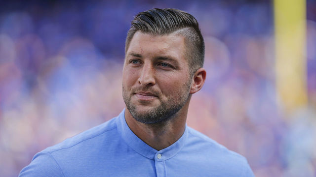GAINESVILLE, FL - OCTOBER 06: Former Florida Gators great Tim Tebow looks on during the game between the LSU Tigers and the Florida Gators on October 6, 2018 at Ben Hill Griffin Stadium at Florida Field in Gainesville, Fl.