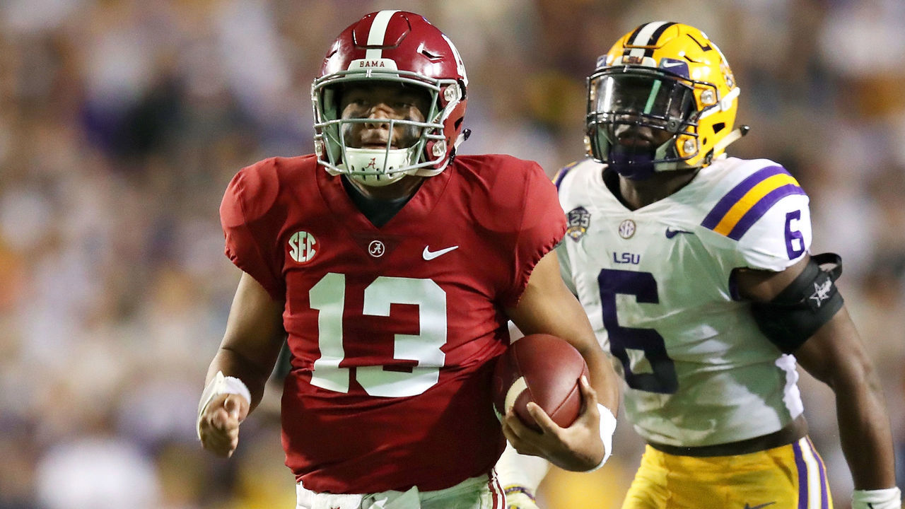 BATON ROUGE, LA - NOVEMBER 03: Tua Tagovailoa #13 of the Alabama Crimson Tide runs for a third quarter touchdown while playing the LSU Tigers at Tiger Stadium on November 3, 2018 in Baton Rouge, Louisiana. Alabama won the game 29-0.
