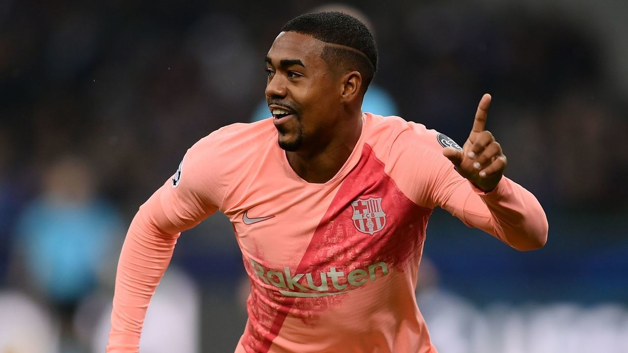 Barcelona's Brazilian midfielder Malcom celebrates after opening the scoring during the UEFA Champions League group B football match Inter Milan vs Barcelona on November 6, 2018 at San Siro stadium in Milan.