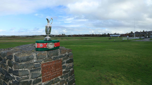 PRESTWICK, SCOTLAND - OCTOBER 17: The original Open Championship Belt and the Claret Jug photographed on the commemorative cairn that is placed where the first shot in Open Championship history was hit on the 17th of October 1860, the first day of the first Open Championship, during the third full day of his Turnberry to Dornoch Scottish GlobalGolf4Cancer '4 flag' campaign walk which he finished at Prestwick Golf Club on October 17, 2018 in Prestwick, Scotland.